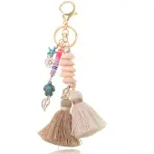 Deja Jewels Handgemaakte Ibiza sleutelhanger goudkleurig beige bruin met schelpjes