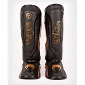 Venum Elite Evo scheenbeschermers zwart/brons