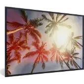 PosterMonkey Fotolijst incl. Poster - Zon schijnt tussen de bladeren van palmbomen - 90x60 cm - Posterlijst