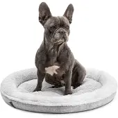 Lionto hondenbed met zacht, donutvormig ontwerp, voorzien van pluche en een antislipbodem. De hoes is wasbaar. Diameter: 65 cm. Kleur: grijs