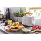 Philips Daily Collection broodrooster HD2582/00 met 8 standen, geïntegreerd broodjesrek, compact ontwerp en stofkap