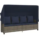 vidaXL Ligbed met luifel en kussens poly rattan grijs