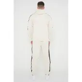 Nike Tribute poly trainingspak voor heren in crème