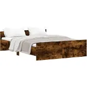 vidaXL Bedframe met hoofd- en voeteneinde gerookt eiken 135x190 cm