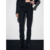 Dilvin Hoog-getailleerde flare leggings met knoopdetail