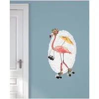 VAN IKKE Muursticker Flamingo op rolschaatsen