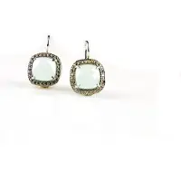 Sophie model Rosella oorringen in zilver gezet met blauwe steen en cubic zirconia