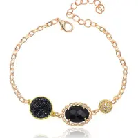 Deja Jewels Goudkleurige verstelbare dames armband met zwart glassteen