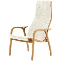Swedese Lamino fauteuil en voetenbankje geolied eiken/schapenvacht Offwhite (wit)