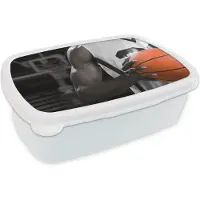 MuchoWow Broodtrommel Wit - Lunchbox - Brooddoos - Zwart wit basketbalspeler met een oranje basketbal - 18x12x6 cm - Volwassenen