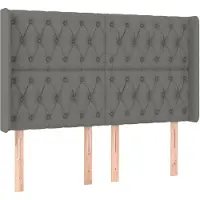 vidaXL Hoofdbord met randen 147x16x118/128 cm stof donkergrijs