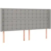 vidaXL Hoofdbord met randen 183x16x118/128 cm stof lichtgrijs