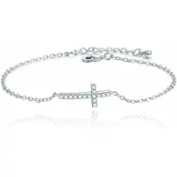 LGT JWLS Smalle Zilverkleurige Armband Dames met Kruis en Steentjes Verstelbaar