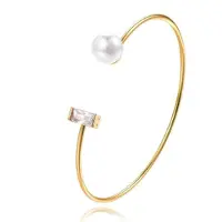 LGT JWLS Goudkleurige armband met Rechthoekige Zirkonia Steen en Imitatie Parel