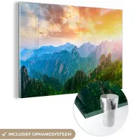 MuchoWow - Glasschilderij natuur - Wanddecoratie - Berg - Natuur - Wolken - Zonsondergang - Steen - Foto op glas - Acrylglas - Schilderij glas - 180x120 cm - Schilderijen woonkamer