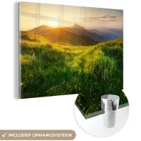 MuchoWow - Glasschilderij - Gras - Bergen - Zon - Natuur - Foto op glas - Wanddecoratie - Schilderij glas - 180x120 cm - Acrylglas - Muurdecoratie - Glasschilderij natuur