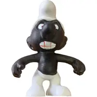 Schleich De zwarte smurf - Boze smurf - Bekend van de stripreeks - - 5,5 cm