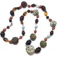 Behave Ketting - lange ketting - kralenketting - bruin - buddha kralen - boeddha motief - 90cm