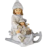 Clayre & Eef Witte Decoratie kind op slee 10*5*10 cm 6PR4665