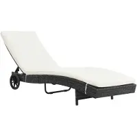 vidaXL Ligbed met wielen en kussen poly rattan zwart
