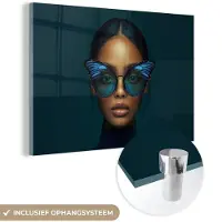 MuchoWow Glasschilderij 180x120 cm - Schilderij acrylglas - Vrouw - Vlinder - Bril - Blauw - Modern - Portret - Foto op glas - Muurdecoratie woonkamer - Wanddecoratie slaapkamer - Schilderijen