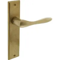 Intersteel Deurkruk Banaan op blind schild - messing getrommeld