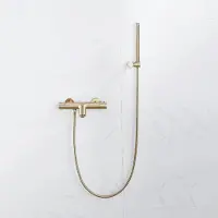 FortiFura Calvi Thermostatische badkraan met staafhanddouche, handdouchehouder en metalen doucheslang Geborsteld Messing PVD (Goud) SW720570/SW720567/SW720226/SW706206