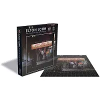 PHD Merchandise : Puzzel van Elton John, met de tekst "Don't Shoot Me I'm Only the Piano Player", artikelnummer PHRSAW046PZ