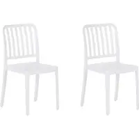 Beliani Set van 2 armloze stoelen lichtgewicht voor in de tuin stapelbaar Weerbestendig kunststof wit