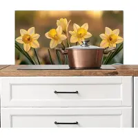 KitchenYeah Spatscherm keuken 90x45 cm - Kookplaat achterwand Bloemen - Geel - Wazig - Muurbeschermer - Spatwand fornuis - Hoogwaardig aluminium