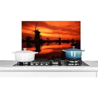 KitchenYeah Spatscherm keuken 60x40 cm - Kookplaat achterwand Molens tijdens zonsondergang - Muurbeschermer - Spatwand fornuis - Hoogwaardig aluminium