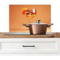 KitchenYeah Spatscherm keuken 60x40 cm - Kookplaat achterwand Drank - Oranje - Glitter - Disco - Muurbeschermer - Spatwand fornuis - Hoogwaardig aluminium