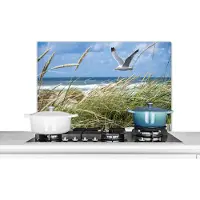 KitchenYeah Spatscherm keuken 90x60 cm - Kookplaat achterwand Strand - Vogel - Planten - Muurbeschermer - Spatwand fornuis - Hoogwaardig aluminium