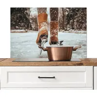 KitchenYeah Spatscherm keuken 90x60 cm - Kookplaat achterwand Schaatsen - IJs - Winter - Sneeuw - Muurbeschermer - Spatwand fornuis - Hoogwaardig aluminium