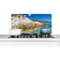 KitchenYeah Spatscherm keuken 90x45 cm - Kookplaat achterwand Zee - Klif - Zomer - Tropisch - Muurbeschermer - Spatwand fornuis - Hoogwaardig aluminium