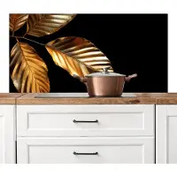 KitchenYeah Spatscherm keuken 120x60 cm - Kookplaat achterwand Blad - Goud - Zwart - Luxe - Muurbeschermer - Spatwand fornuis - Hoogwaardig aluminium