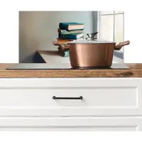 KitchenYeah Spatscherm keuken 60x30 cm - Kookplaat achterwand Stapel - Boeken - Groen - Daglicht - Muurbeschermer - Spatwand fornuis - Hoogwaardig aluminium