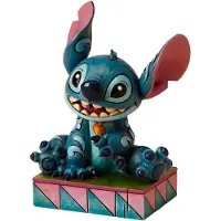 Disney Beeldje - Lilo Et Stitch - Traditions Stitch Zittend En Glimlachend