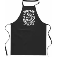 Mijncadeautje Vintage Awesome ** years - Keukenschort - kookschort - 100% katoen - BBQ - verjaardag en feest - cadeau - kado - unisex - zwart - leeftijd - 73