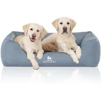 Knuffelwuff orthopedisch waterafstotend hondenbed Leon van velours met handgeweven karakter XL 105 x 75cm lichtblauw