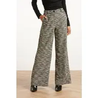 Smashed Lemon Losvallende zwart wit broek met wijde pijpen en tweedlook stof |
