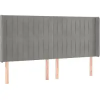 vidaXL Hoofdbord met randen 183x16x118/128 cm fluweel lichtgrijs