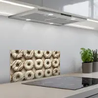 KitchenYeah Spatscherm 70x30 cm - Zelfklevende achterwand Donuts - Chocolade - Wit - Beige - Keuken muurbeschermer - Spatwand fornuis