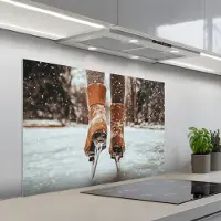 KitchenYeah Spatscherm 100x65 cm - Zelfklevende achterwand Schaatsen - IJs - Winter - Sneeuw - Keuken muurbeschermer - Spatwand fornuis