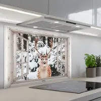 KitchenYeah Spatscherm 90x60 cm - Zelfklevende achterwand Doorkijk - Hert - Sneeuw - Winter - Bos - Dieren - Natuur - Keuken muurbeschermer - Spatwand fornuis