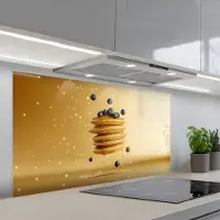 KitchenYeah Spatscherm 120x60 cm - Zelfklevende achterwand Pannenkoeken - Eten - Honing - Geel - Keuken muurbeschermer - Spatwand fornuis