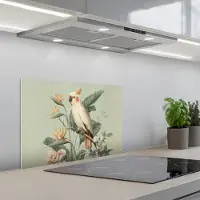 KitchenYeah Spatscherm 60x40 cm - Zelfklevende achterwand Gele kuifkaketoe - paradijsvogelbloemen - Groen - Keuken muurbeschermer - Spatwand fornuis