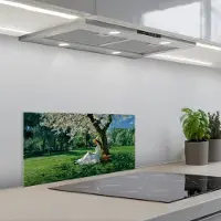 KitchenYeah Spatscherm 70x30 cm - Zelfklevende achterwand Vrouw - Boom - Boek - Mandje - Keuken muurbeschermer - Spatwand fornuis