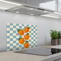 KitchenYeah Spatscherm 60x45 cm - Zelfklevende achterwand Sinaasappels - Blaadjes - Geblokt - Blauw - Keuken muurbeschermer - Spatwand fornuis