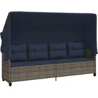 vidaXL Ligbed met luifel en kussens poly rattan grijs